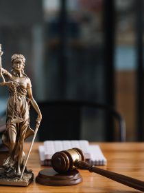statue-of-lady-justice-on-desk-of-a-judge-or-lawye-SVECXT5.jpg